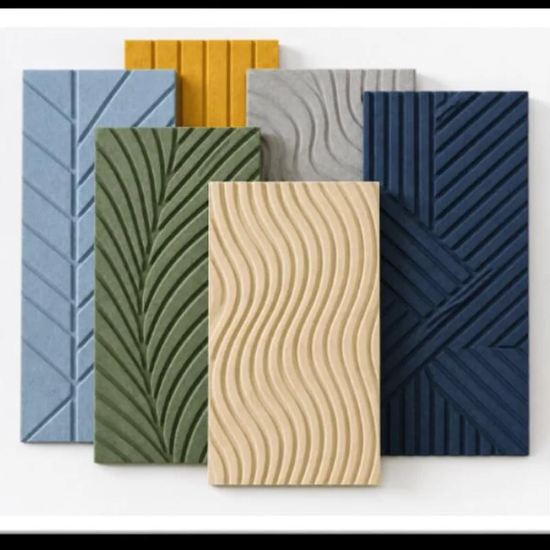 Six acoustic panels in blue, mustard, green, grey, sand and navy with carved line, leaf, wave and diagonal groove patterns